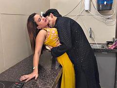 The beautiful wife was cooking in the kitchen when the husband came and started having sex in the kitchen itself