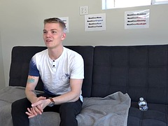 Solo amateur twink with tattoos jerks his cock at a casting