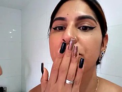 Couple masturbating in the bathroom