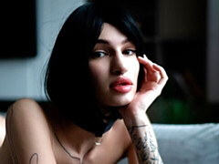 Gorgeous busty doll MarfaQ shows off her naked shaved pussy