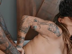 Tattooed bisex milf in black lingerie gets fucked in a threesome