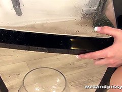 Cleaning up piss with her tongue: WetandPissy's kinky European toy play