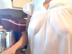 Mature woman in sheer granny nightgown, natural tits