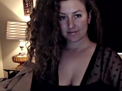 Brunette with big boobs masturbates on webcam