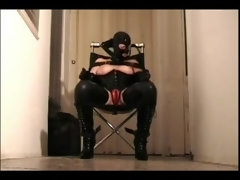 Strapped milf in latex sucks big dildo in mask till cumsprayed