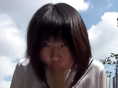 Asian teen rides dildo