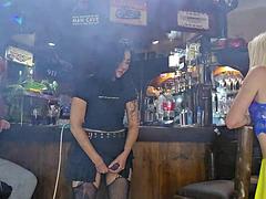 Girls fucking each other with strapless dildo while husbands watch