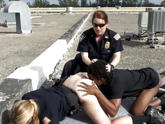 Busty female cops are fucking with black suspect on the roof