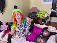Rainbow sissy Natasha eats cum