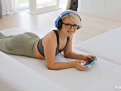 Kittina Clariette Struggles Between Raul Costas Massive Cock and Video Games in Steamy Lesbian Hardcore Action