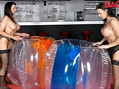 DaCada and Julia Play With Some Huge Balls Together