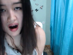 Sexy Asian Chick Fucking Her Cunt With Brown Dildo