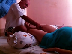 Pregnant woman getting leg massage