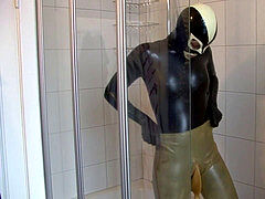 youthfull latex Fetish doll Fully Rubberized With Pisspants And Gasmask