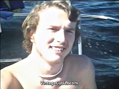 Young Couple Relaxing on the Yacht (1970s Vintage)