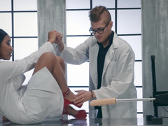 A sexy girl is licking the doctor in the laboratory after using the machine